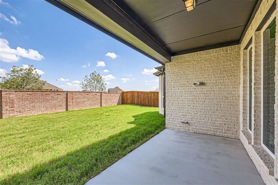 View of yard featuring a patio