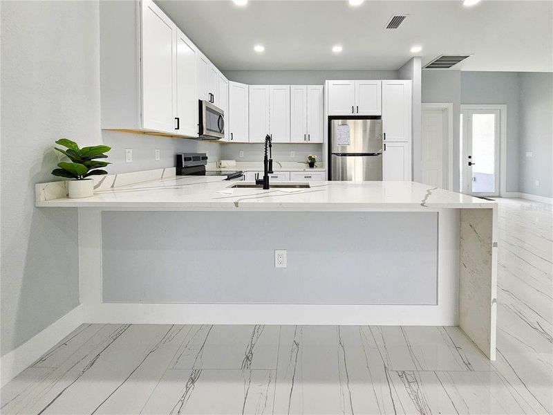 Furnished interior view inside a new home in , Lehigh Acres (Image 3).