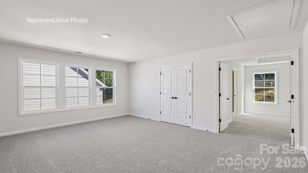 Spacious, unfurnished interior of a new home in Sanctuary at Southgate, Indian Trail (Image 26).