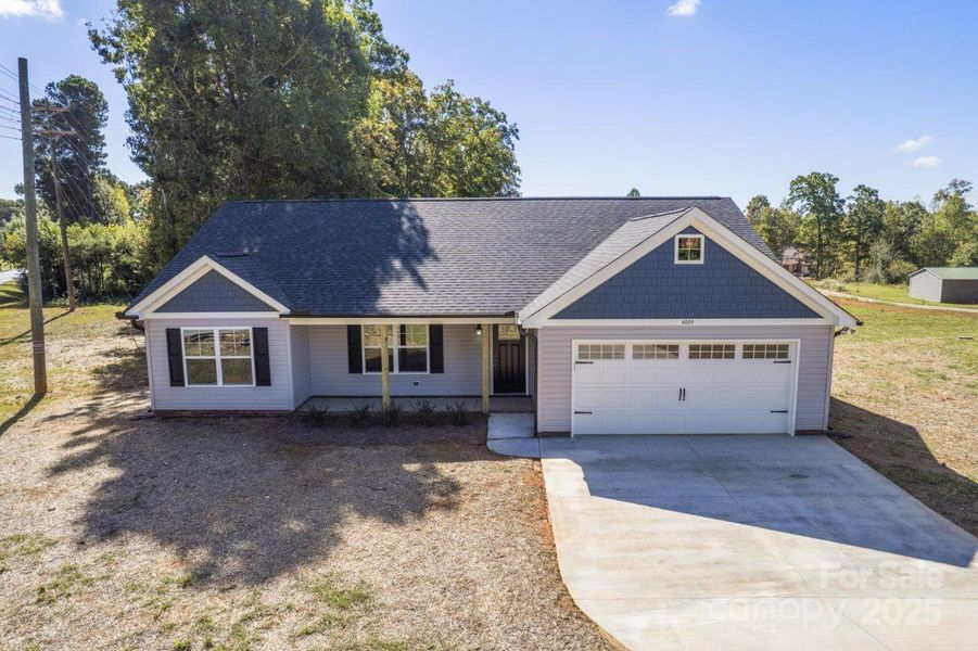 Front exterior of a new home in , Asheboro, NC, highlighting curb appeal (Image 18). Front exterior of a new home in , Asheboro, NC, highlighting curb appeal (Image 18).