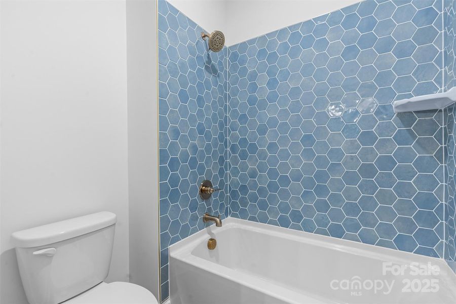 *representative photo- jack & jill full bath connecting bedrooms 3 & 4. pocket door and separate commode room