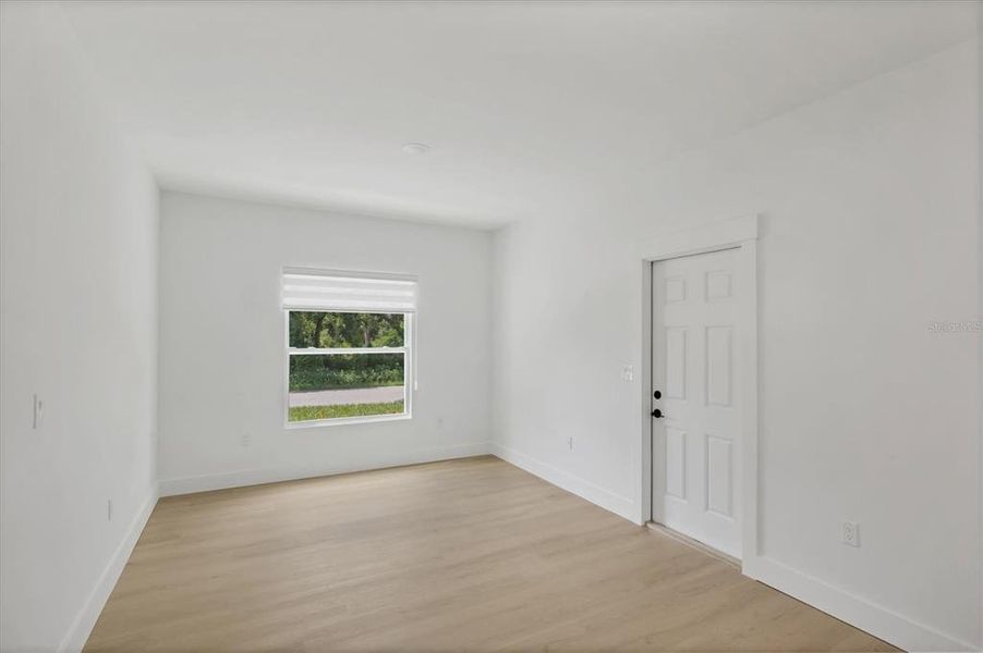 Spacious, unfurnished interior of a new home in , Port Charlotte (Image 36).