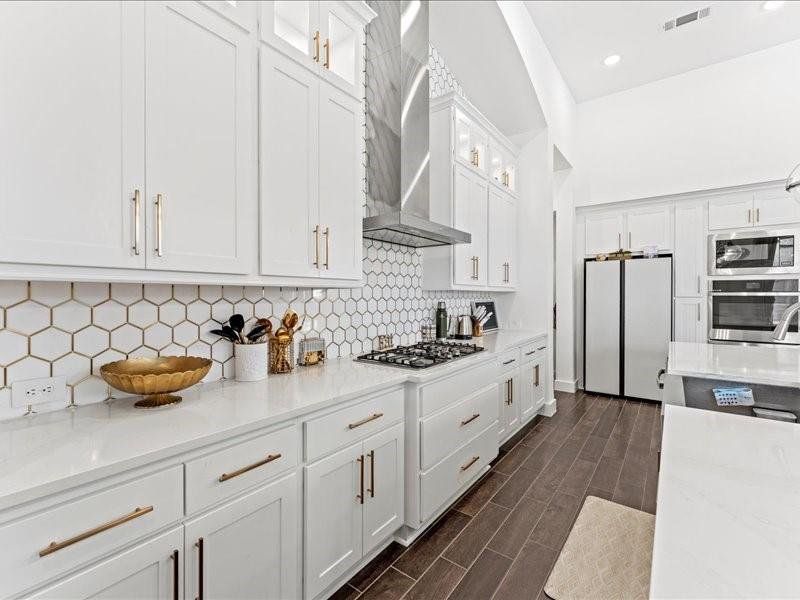 This upgraded kitchen backsplash makes a statement of distinction This upgraded kitchen backsplash makes a statement of distinction