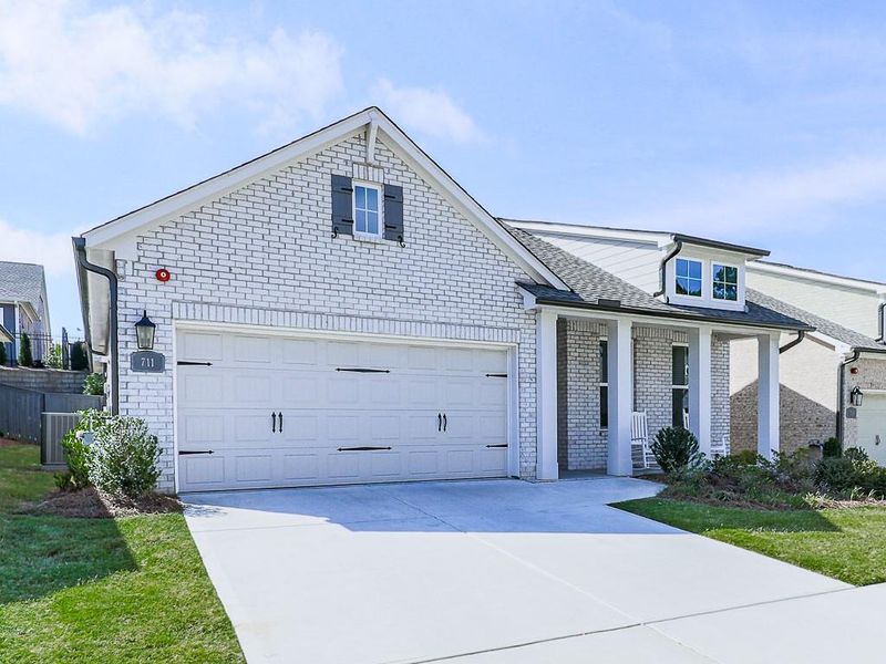 Front exterior of a new home in Glenhaven at Ridgewalk, Woodstock, GA, highlighting curb appeal (Image 30).