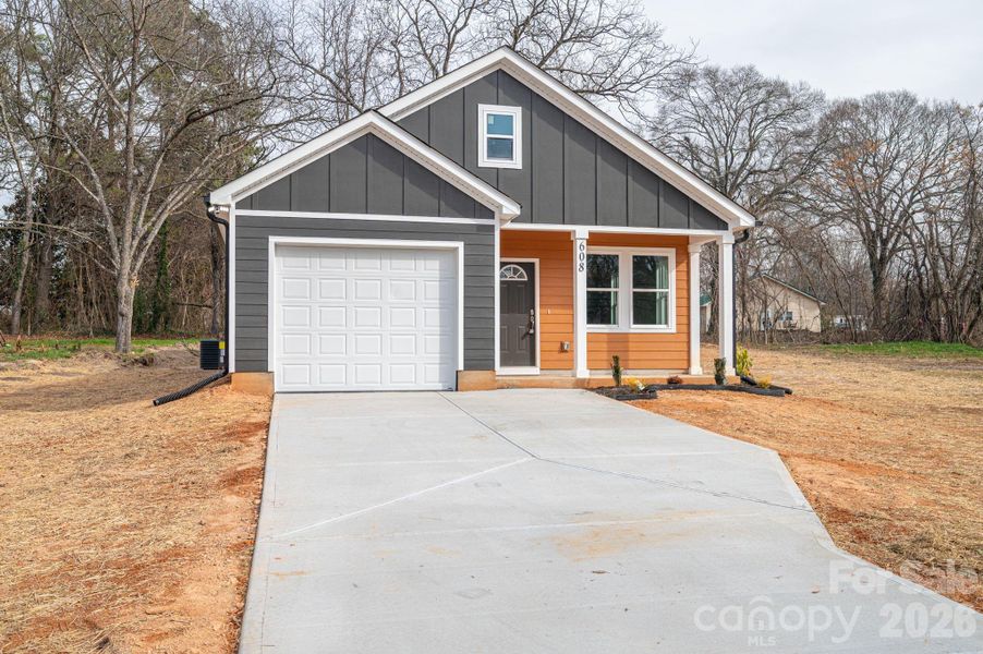 Front exterior of a new home in , Cherryville, NC, highlighting curb appeal (Image 26).