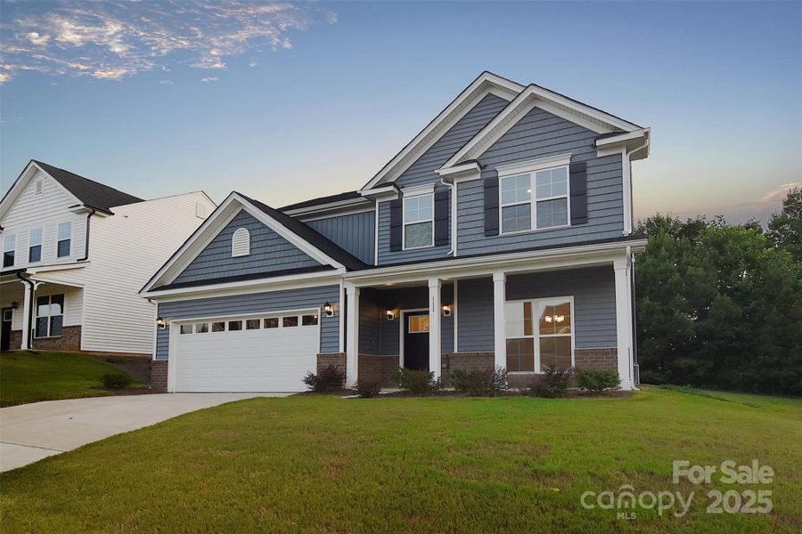 Front exterior of a new home in Larkin, Statesville, NC, highlighting curb appeal (Image 1).