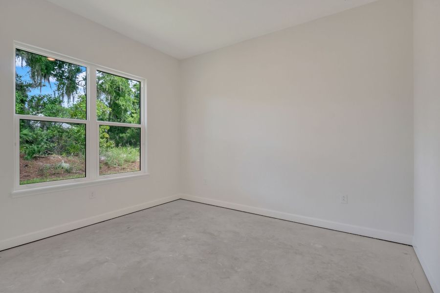 Representative unfurnished interior of a home built from the The Courtyard Junior by ABD Development in Toscana, Palm Coast (Image 34).