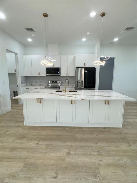 Furnished interior view inside a new home in , Frostproof (Image 7).