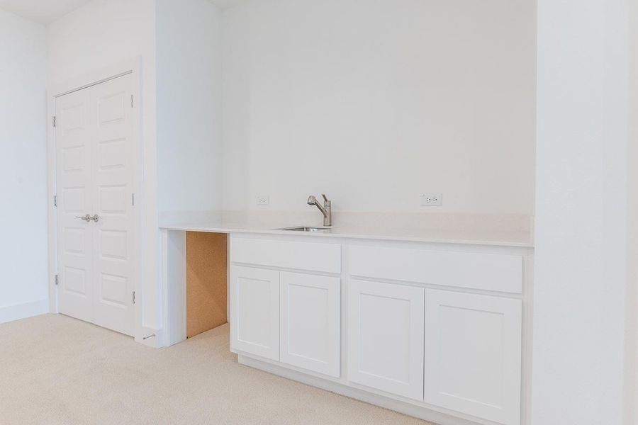 Furnished interior view inside a new home in Hilltop Ranch, Leander (Image 33).