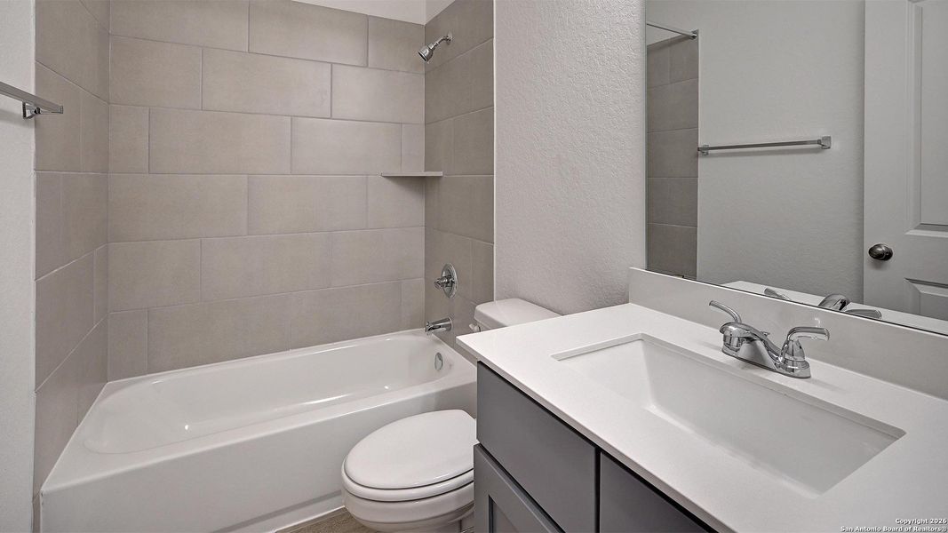 Furnished interior view inside a new home in Ladera 40', San Antonio (Image 19).