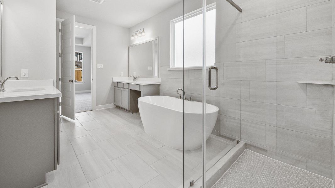 Furnished interior view inside a new home in Sunterra, Katy (Image 17).