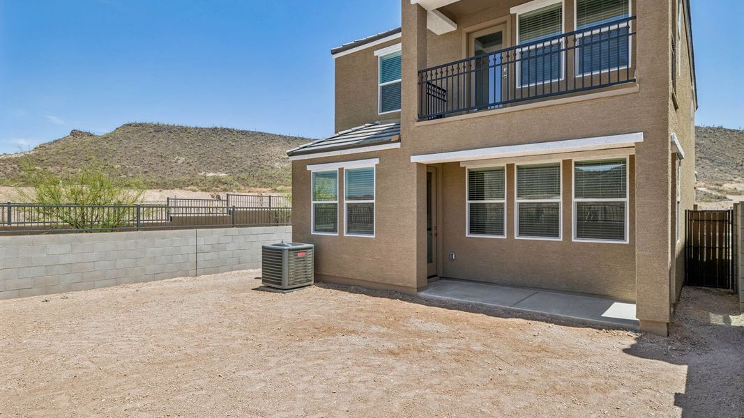 Exterior details and patio area of a home in The Buttes at Mystic, Peoria (Image 3). Exterior details and patio area of a home in The Buttes at Mystic, Peoria (Image 3).