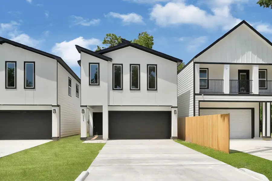 Front exterior of a new home in , Houston, TX, highlighting curb appeal (Image 1).