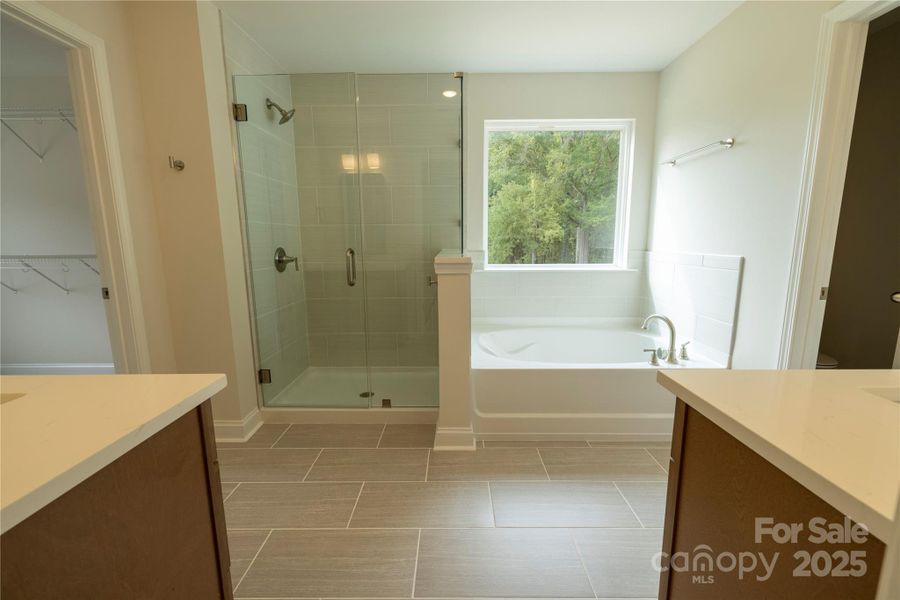 Beautiful Tile / Glass Shower and Garden Tub