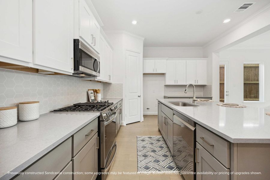 Meet your new culinary partner: a 5-burner LG gas range surrounded by sleek cabinetry, soft-close drawers, and an eye-catching backsplash that makes even takeout feel gourmet. Meet your new culinary partner: a 5-burner LG gas range surrounded by sleek cabinetry, soft-close drawers, and an eye-catching backsplash that makes even takeout feel gourmet.