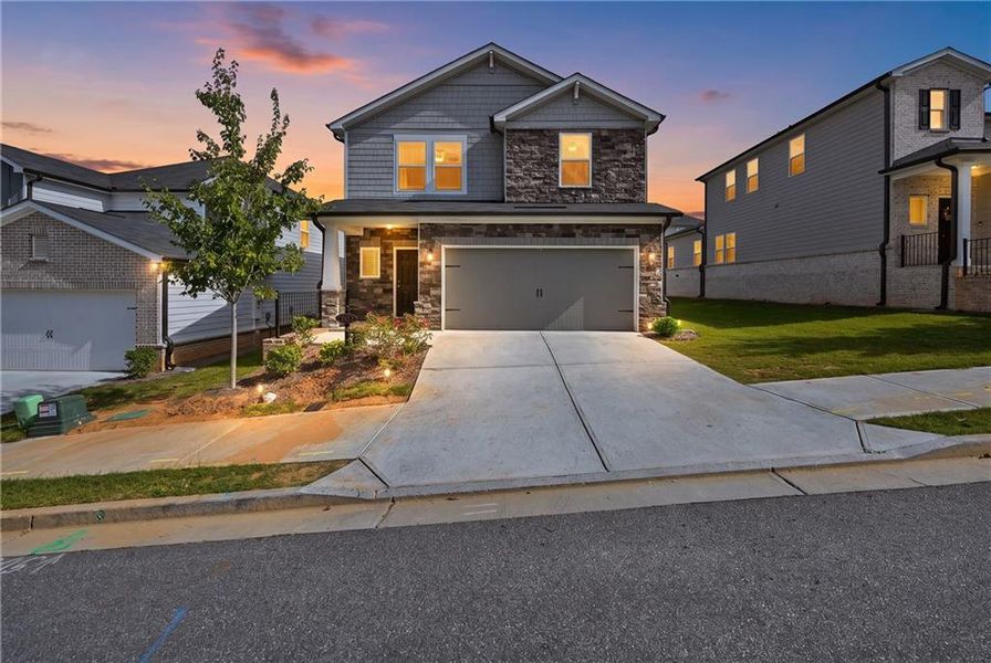 Front exterior of a new home in Sweetwater Green - Royal Series, Lawrenceville, GA, highlighting curb appeal (Image 23).