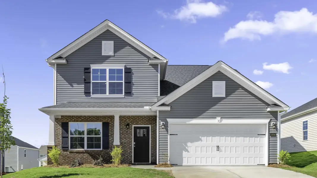 Front exterior of a new home in Middleton, Greensboro, NC, highlighting curb appeal (Image 1). Front exterior of a new home in Middleton, Greensboro, NC, highlighting curb appeal (Image 1).
