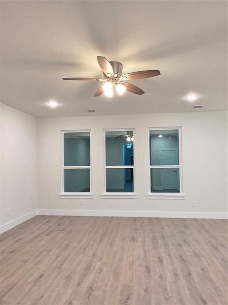 Picture of widows in living room.