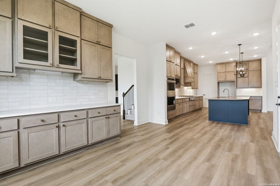 Furnished interior view inside a new home in Enchanted Bluff, San Antonio (Image 18).