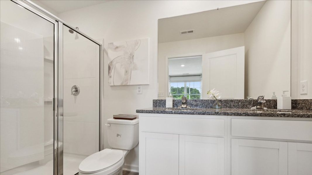 Representative furnished interior of a home built from the Altamont Townhome by D.R. Horton in Saint Marc's, Powell (Image 17).