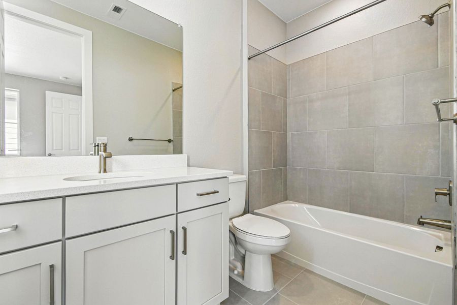 Furnished interior view inside a new home in Trailstone, Arvada (Image 28).