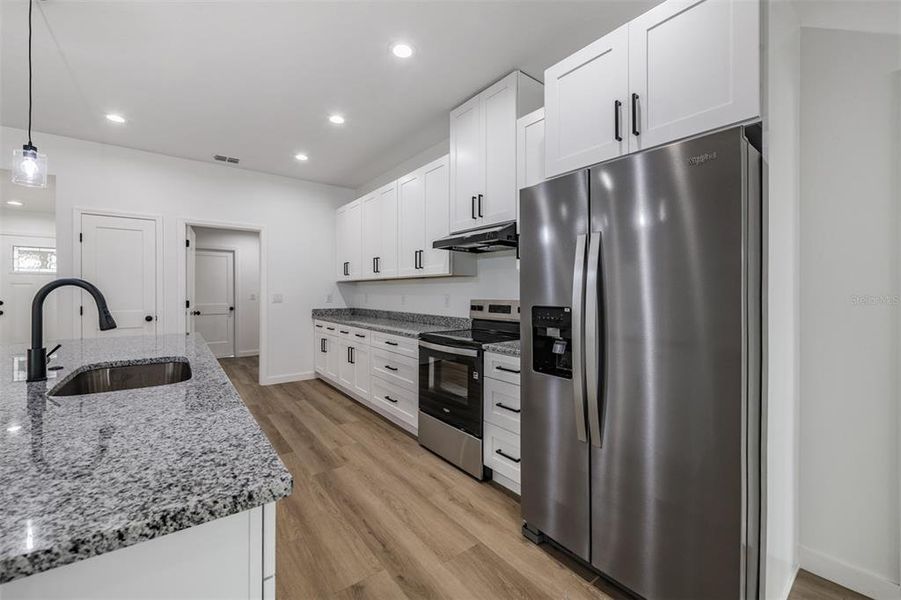 Furnished interior view inside a new home in , Dade City (Image 12).