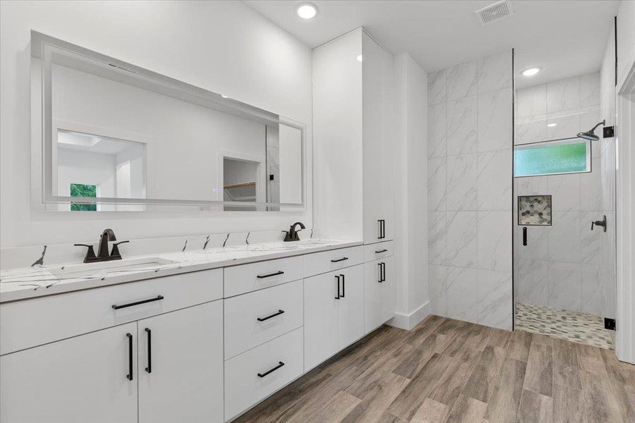 Primary Bathroom featuring double vanity Primary Bathroom featuring double vanity