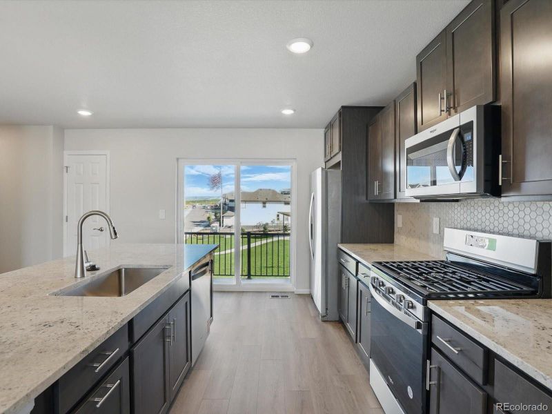 Furnished interior view inside a new home in Three Hills, Morrison (Image 12).