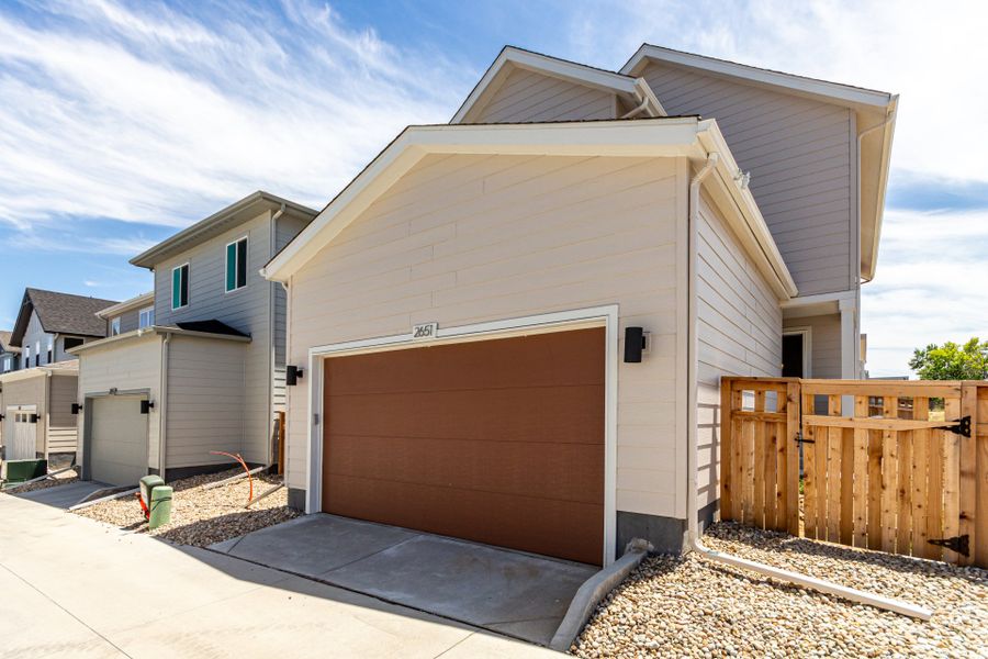 Front exterior of a new home in Arras Park, Thornton, CO, highlighting curb appeal (Image 29).