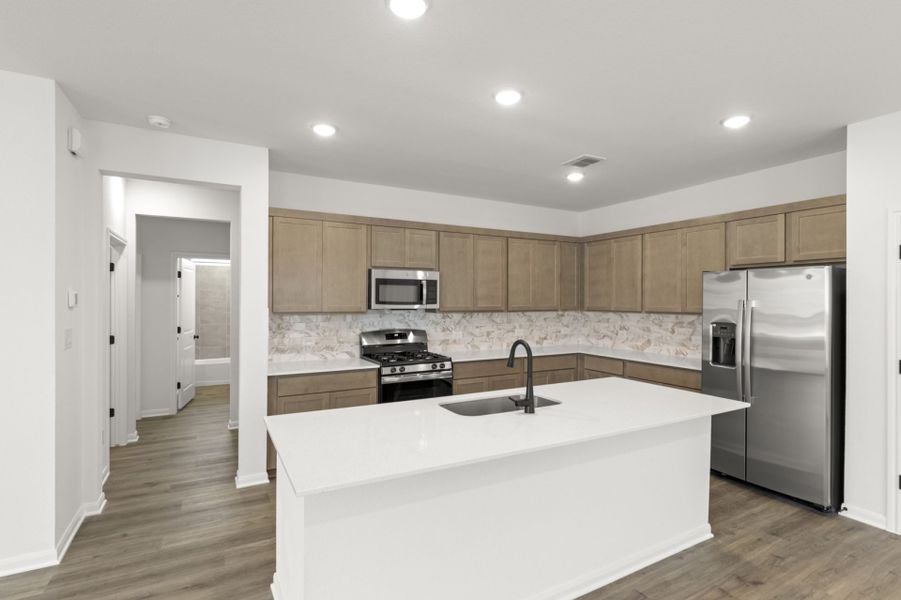 Furnished interior view inside a new home in Village at Three Oaks, Seguin (Image 8). Furnished interior view inside a new home in Village at Three Oaks, Seguin (Image 8).