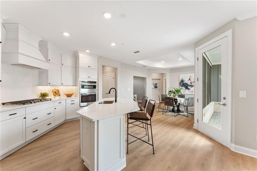 Furnished interior view inside a new home in The Courtyards of Franklin Goldmine, Cumming (Image 4).
