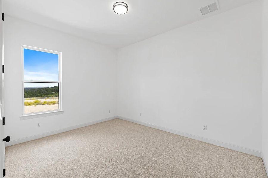 Spacious, unfurnished interior of a new home in Lariat - 70', Liberty Hill (Image 18).