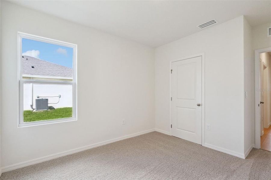Spacious, unfurnished interior of a new home in , Daytona Beach (Image 25).