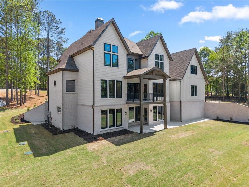 Front exterior of a new home in , Flowery Branch, GA, highlighting curb appeal (Image 29).