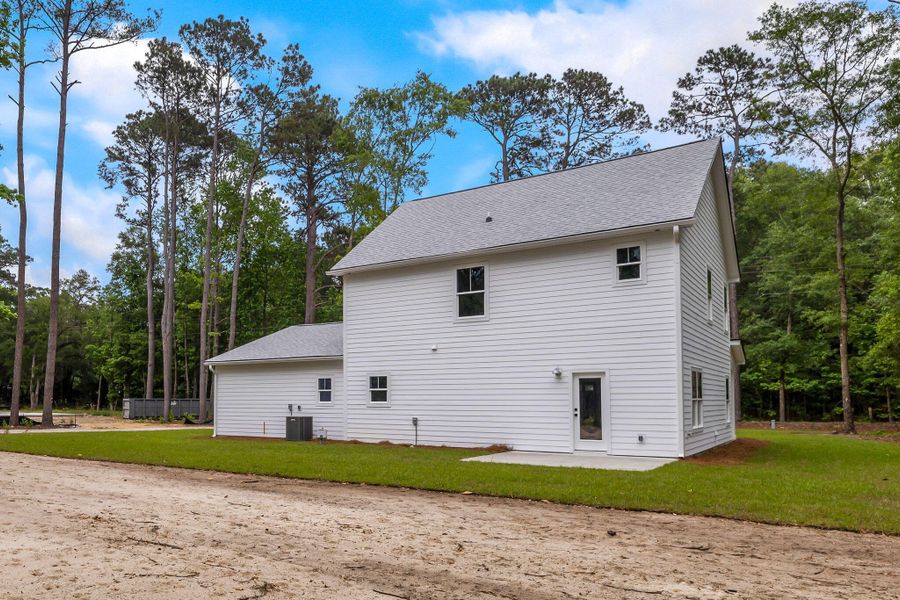 Exterior details and patio area of a home in , Johns Island (Image 20).
