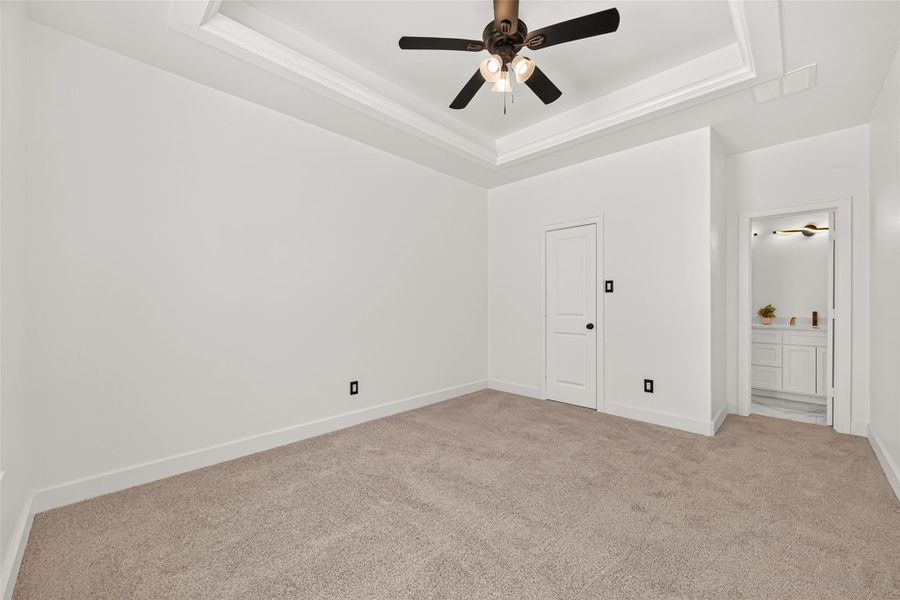 Second generously sized primary bedroom offers exceptional flexibility for homeowners and guests.