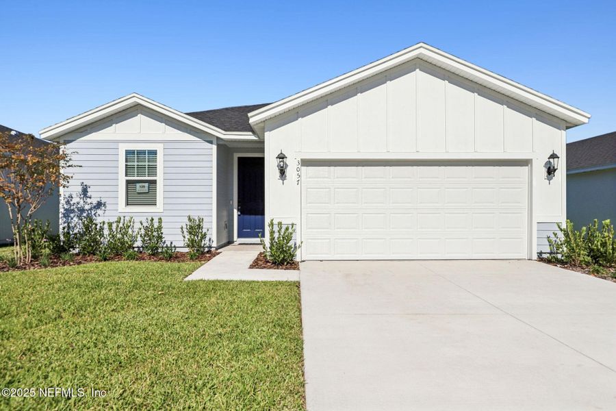 Front exterior of a new home in Lakes at Bella Lago - Signature Series, Green Cove Springs, FL, highlighting curb appeal (Image 1). Front exterior of a new home in Lakes at Bella Lago - Signature Series, Green Cove Springs, FL, highlighting curb appeal (Image 1).