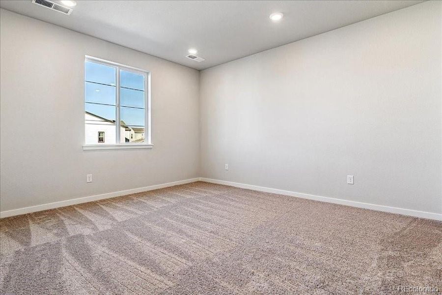 Spacious, unfurnished interior of a new home in Floret Collection at Alder Creek, Parker (Image 13).