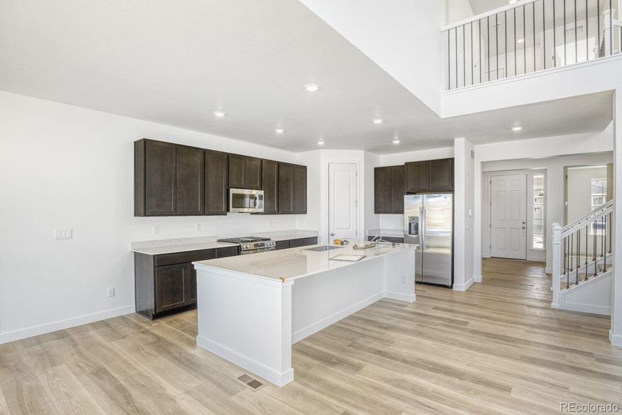 Furnished interior view inside a new home in Newlin Crossing, Parker (Image 7).