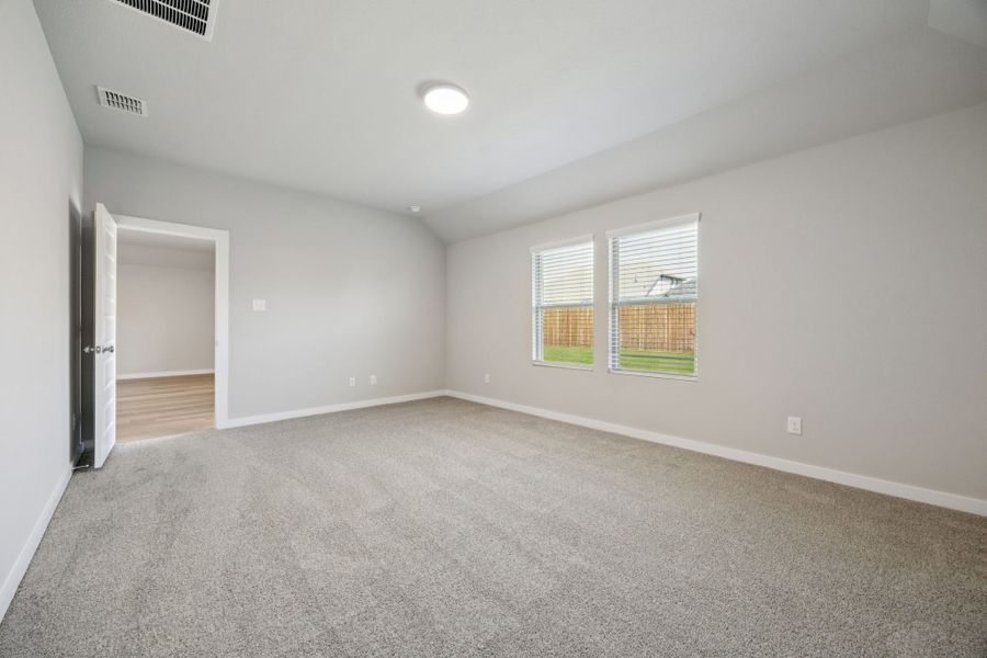 Primary Suite in the Oscar home plan by Trophy Signature Homes – REPRESENTATIVE PHOTO Primary Suite in the Oscar home plan by Trophy Signature Homes – REPRESENTATIVE PHOTO