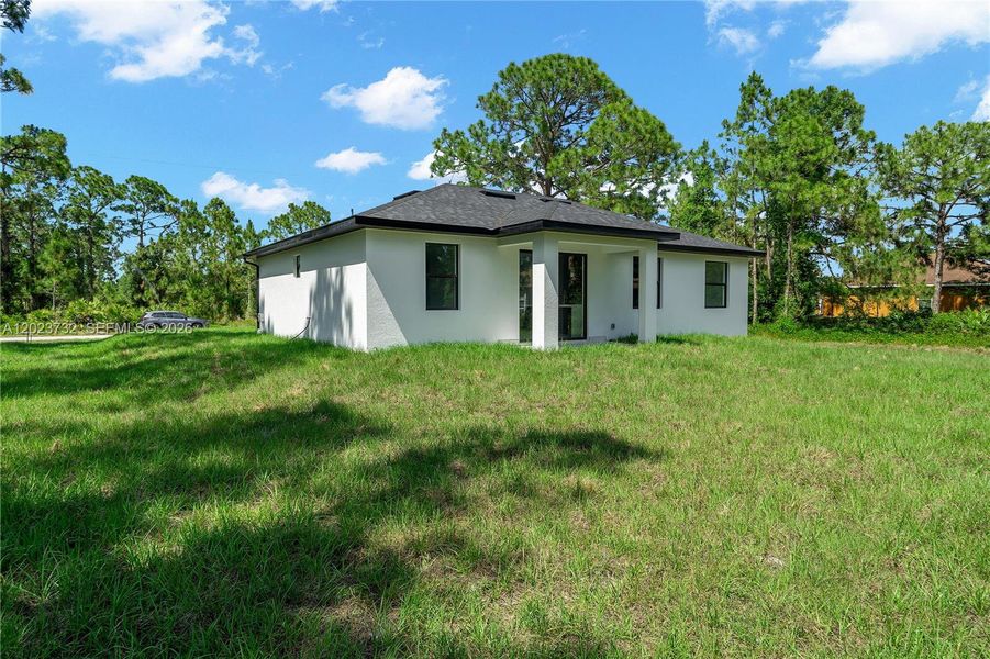Exterior details and patio area of a home in , Lehigh Acres (Image 31).