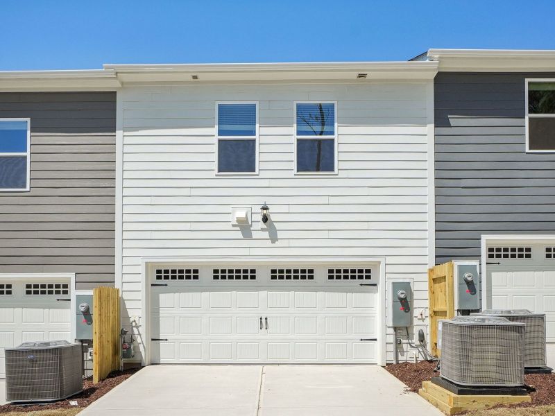 A two-car garage provides plenty of parking and storage space.