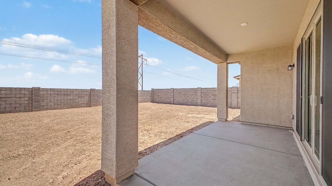 Exterior details and patio area of a home in The Lakes at Rancho El Dorado, Maricopa (Image 3).