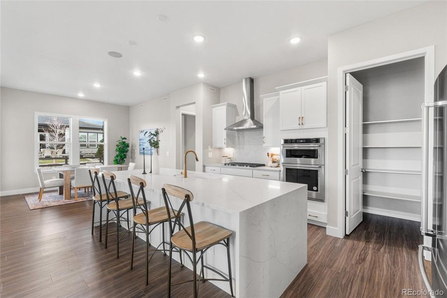 Furnished interior view inside a new home in Hilltop at Inspiration, Aurora (Image 9).