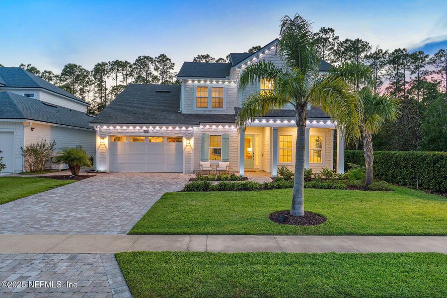 Front exterior of a new home in Palm Crest AT Seabrook, Ponte Vedra, FL, highlighting curb appeal (Image 29).