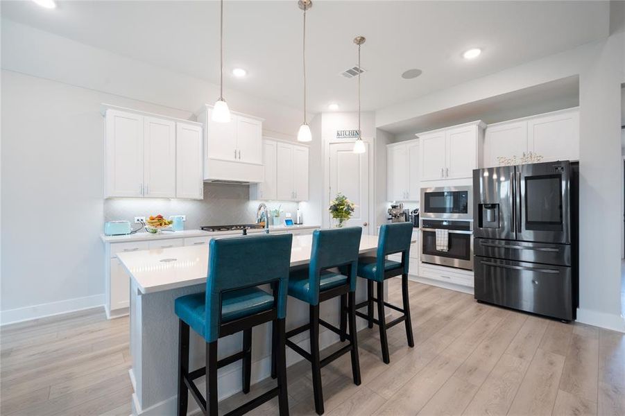 Furnished interior view inside a new home in , Little Elm (Image 14).