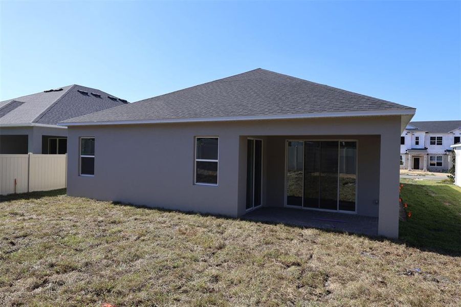 Exterior details and patio area of a home in Emerson Pointe, Apopka (Image 14).