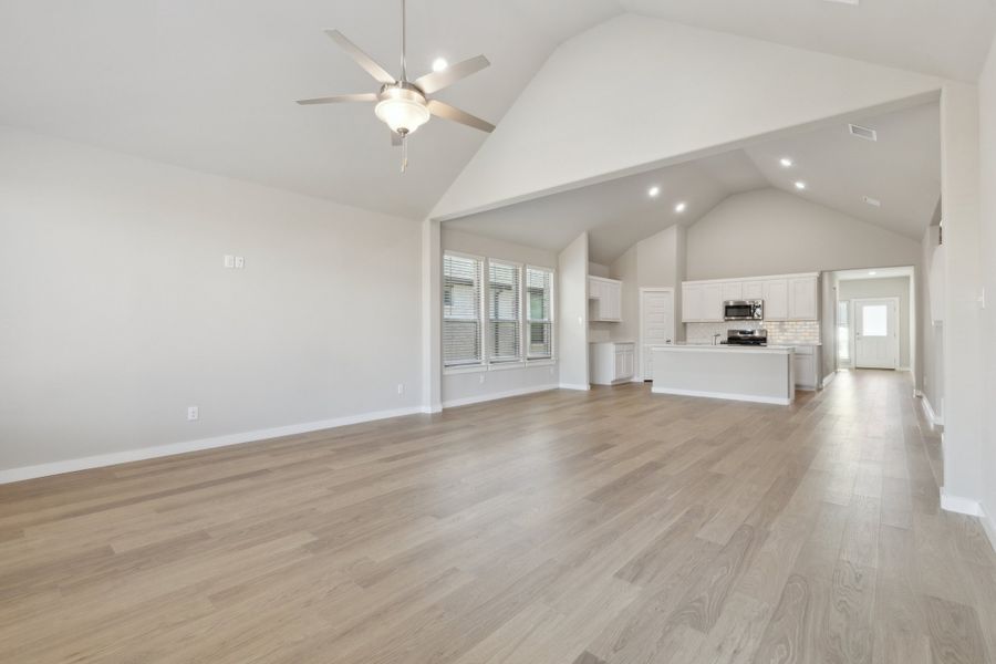 Living Room in the Claret home plan by Trophy Signature Homes – REPRESENTATIVE PHOTO