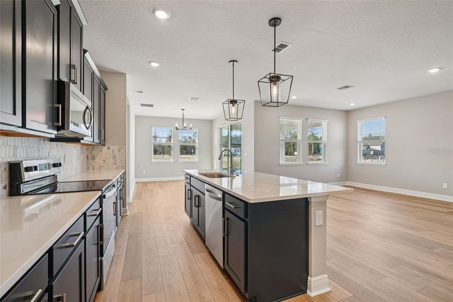 Furnished interior view inside a new home in Legends Preserve - Signature Series, Daytona Beach (Image 6). Furnished interior view inside a new home in Legends Preserve - Signature Series, Daytona Beach (Image 6).
