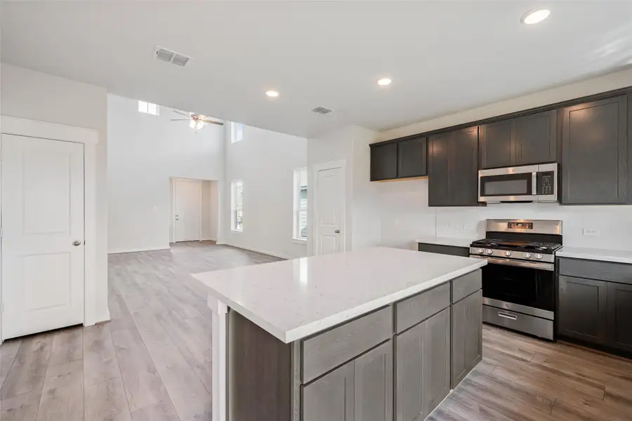 Furnished interior view inside a new home in Cielo, Conroe (Image 6).